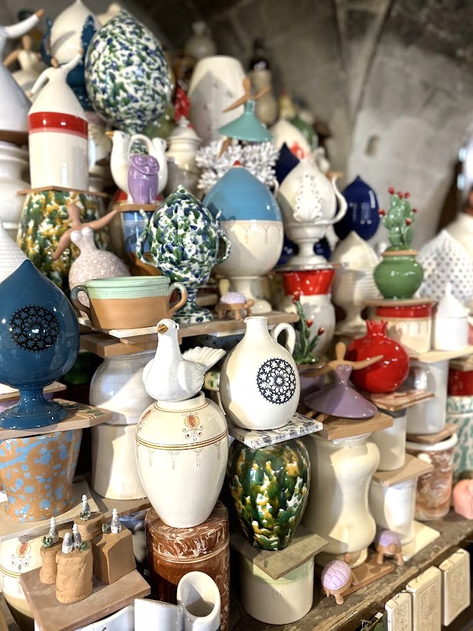 Hands-on ceramic making with local artisans in Grottaglie, Puglia.