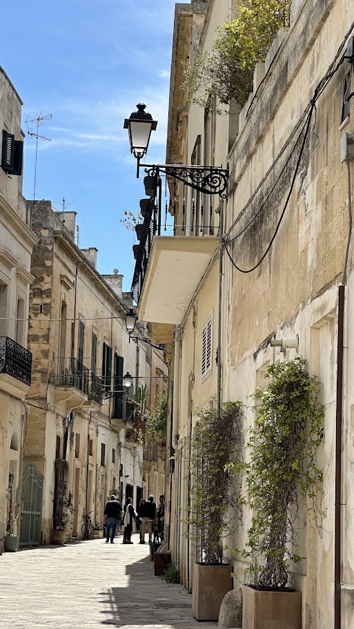 arrow streets of Lecce lined with limestone buildings and hidden artisan shops